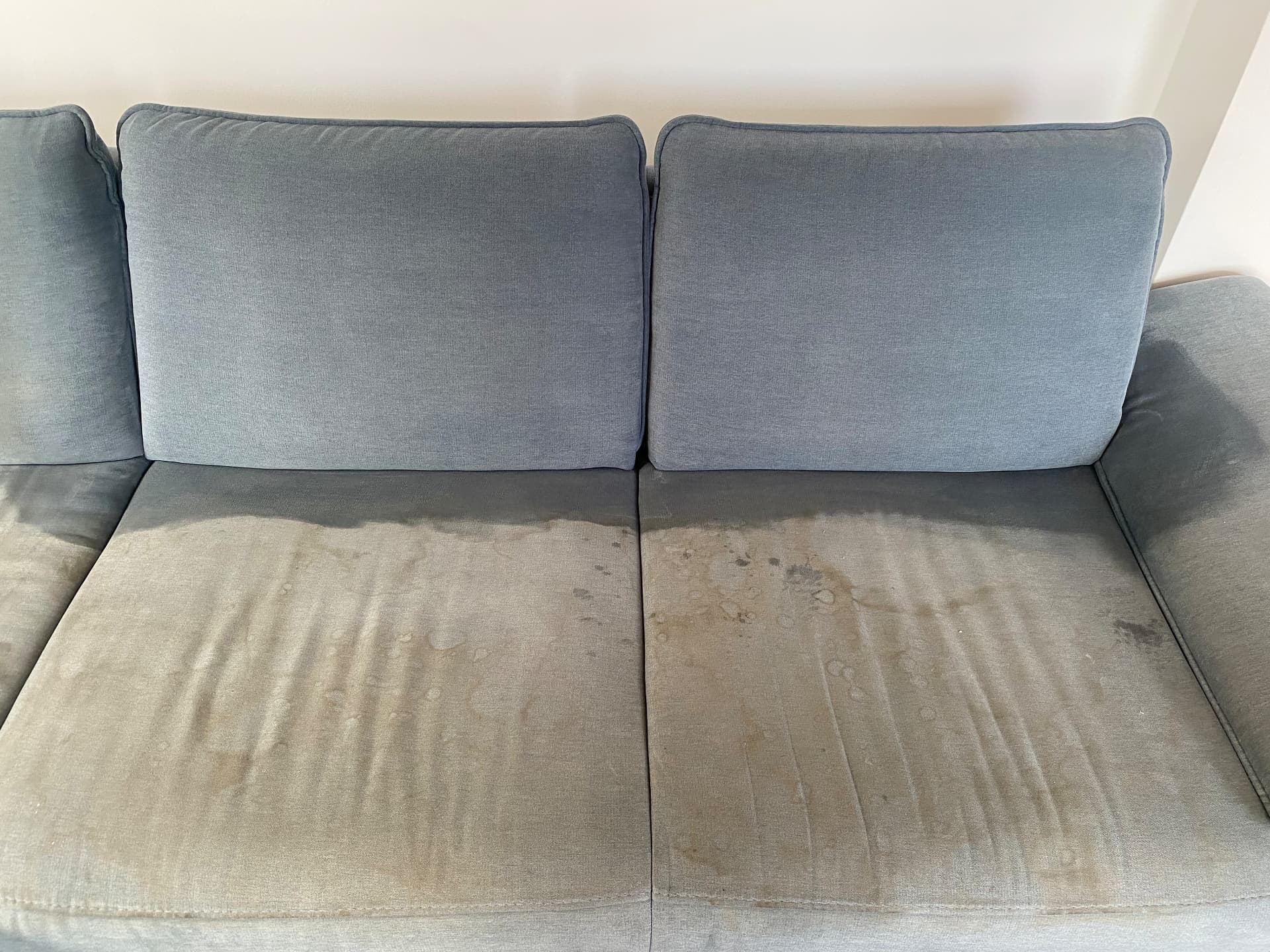 Stoffsofa grau · München vorher